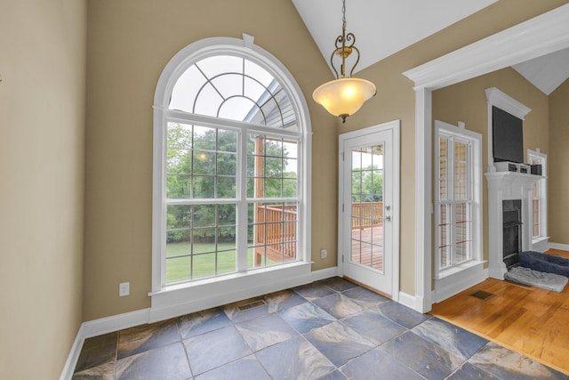 57 Clear Springs Dr, Ringgold, GA 30736 - entryway with lofted ceiling, a fireplace, baseboards, and dark stone finish flooring