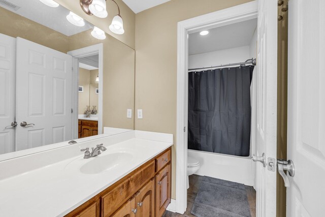 57 Clear Springs Dr, Ringgold, GA 30736 - bathroom featuring vanity, toilet, shower / bath combo with shower curtain, and tile patterned flooring