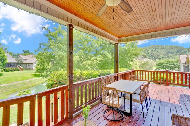 3429 Willow Lake Cir, Chattanooga, TN 37419 - wooden terrace with a ceiling fan, outdoor dining space, and a yard