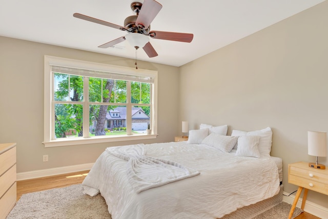 3429 Willow Lake Cir, Chattanooga, TN 37419 - bedroom featuring baseboards, wood finished floors, and a ceiling fan