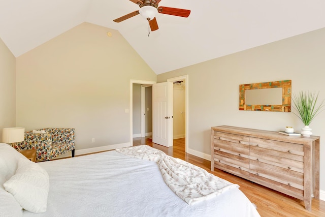3429 Willow Lake Cir, Chattanooga, TN 37419 - bedroom with a walk in closet, wood finished floors, baseboards, a ceiling fan, and high vaulted ceiling