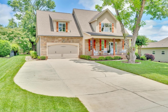 3429 Willow Lake Cir, Chattanooga, TN 37419 - craftsman house featuring a porch, stone siding, driveway, and a front lawn