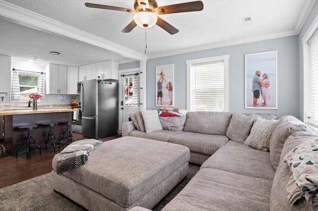 142 Jones Dr, Dunlap, TN 37327 - living room with ceiling fan, dark wood-style floors, and crown molding