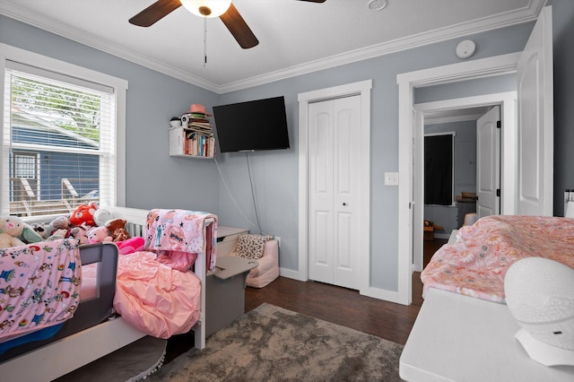 142 Jones Dr, Dunlap, TN 37327 - bedroom featuring crown molding, wood finished floors, a closet, a ceiling fan, and baseboards