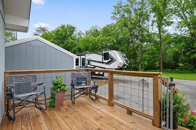 142 Jones Dr, Dunlap, TN 37327 - wooden deck with view of wooded area