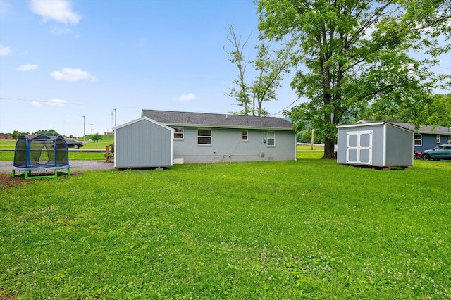 142 Jones Dr, Dunlap, TN 37327 - rear view of house with a trampoline, a lawn, and crawl space