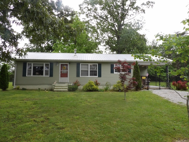 634 Bellvue Cir, Spencer, TN 38585 - single story home featuring a gate, a front lawn, and metal roof