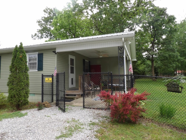 634 Bellvue Cir, Spencer, TN 38585 - view of front facade featuring metal roof