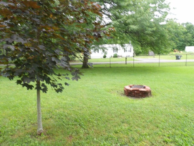 634 Bellvue Cir, Spencer, TN 38585 - view of yard with a fire pit