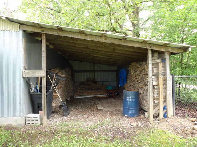 634 Bellvue Cir, Spencer, TN 38585 - view of car parking featuring a pole building