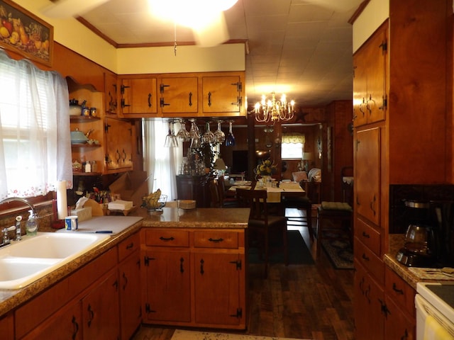 634 Bellvue Cir, Spencer, TN 38585 - kitchen with a sink, a chandelier, dark wood-style floors, and plenty of natural light