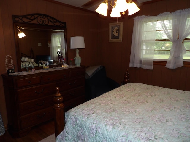 634 Bellvue Cir, Spencer, TN 38585 - bedroom with wood walls and wood finished floors