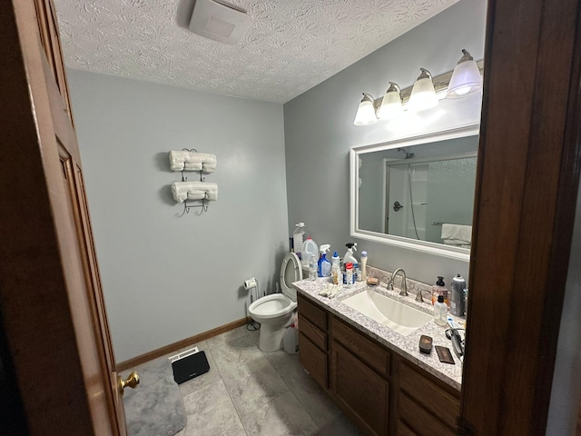 516 Keck St, Seymour, TN 37865 - full bath featuring toilet, vanity, a shower, and a textured ceiling