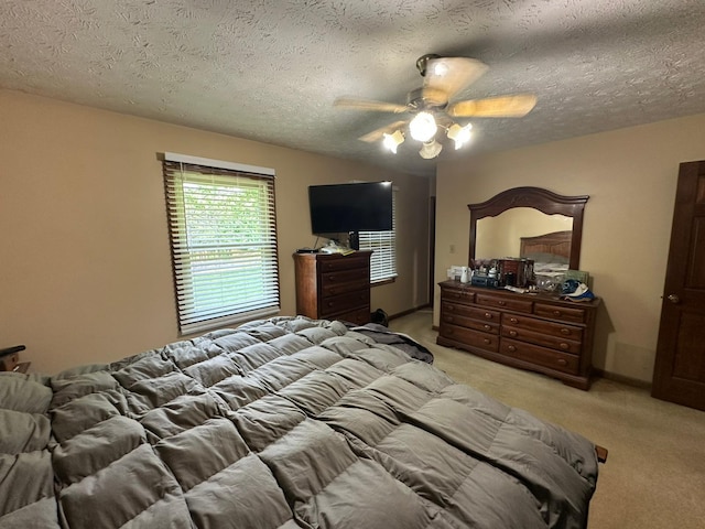 516 Keck St, Seymour, TN 37865 - bedroom with light carpet, a textured ceiling, and a ceiling fan
