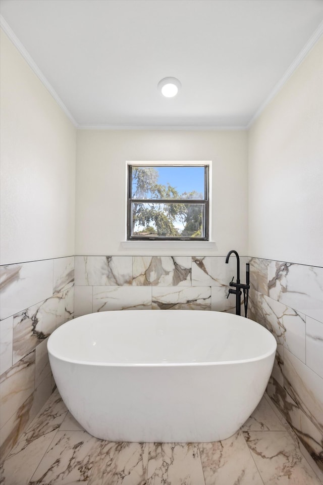 2138 Vaden Village Dr, Chattanooga, TN 37421 - bathroom with tile walls, marble finish flooring, ornamental molding, a freestanding bath, and wainscoting