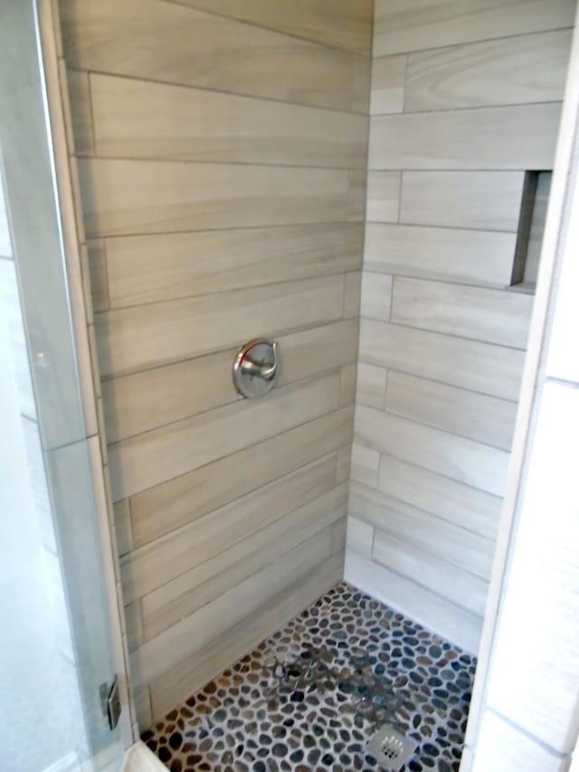 135 Joseph Daniel Ln, Jasper, TN 37347 - bathroom with a shower stall and tile patterned flooring
