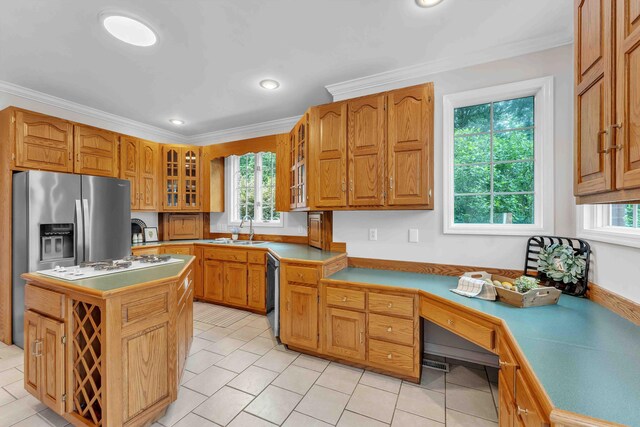 4155 Freewill Rd NW, Cleveland, TN 37312 - kitchen with a sink, appliances with stainless steel finishes, plenty of natural light, glass insert cabinets, and crown molding