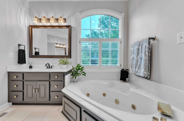 4155 Freewill Rd NW, Cleveland, TN 37312 - full bathroom with a jetted tub, vanity, and tile patterned flooring