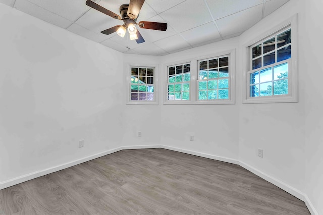 4155 Freewill Rd NW, Cleveland, TN 37312 - spare room with a drop ceiling, a ceiling fan, wood finished floors, and baseboards