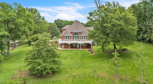 4155 Freewill Rd NW, Cleveland, TN 37312 - rear view of property featuring a lawn
