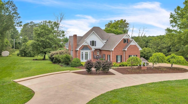 4155 Freewill Rd NW, Cleveland, TN 37312 - traditional home featuring brick siding and a front lawn