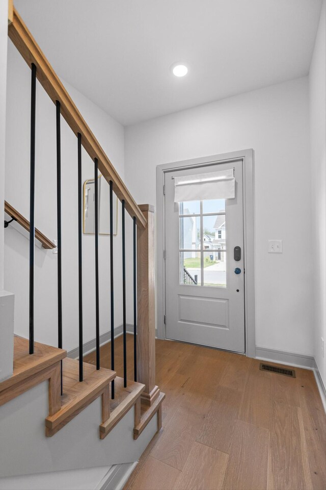 6430 Dharma Loop, Chattanooga, TN 37412 - foyer featuring stairs, wood finished floors, and recessed lighting