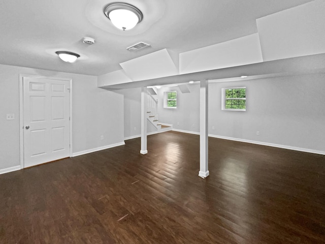 6562 Esquire Ln, Hixson, TN 37343 - basement featuring stairway, wood finished floors, and baseboards