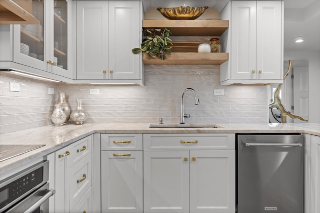 1131 Stringers Ridge Rd Unit 12E, Chattanooga, TN 37405 - kitchen with appliances with stainless steel finishes, a sink, open shelves, white cabinetry, and glass insert cabinets