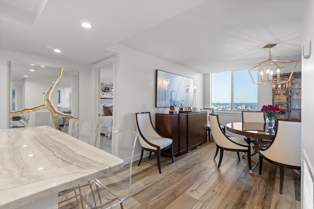 1131 Stringers Ridge Rd Unit 12E, Chattanooga, TN 37405 - dining area featuring light wood-style floors, a chandelier, baseboards, and recessed lighting