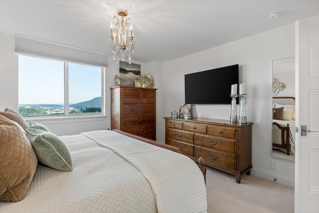 1131 Stringers Ridge Rd Unit 12E, Chattanooga, TN 37405 - bedroom featuring light carpet and a chandelier