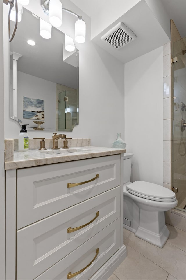 1131 Stringers Ridge Rd Unit 12E, Chattanooga, TN 37405 - full bathroom featuring toilet, a stall shower, tile patterned floors, and vanity