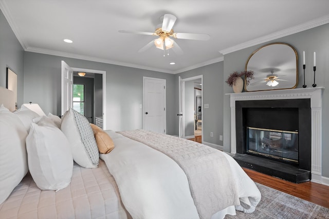 1714 S Crest Manor Ln, Chattanooga, TN 37404 - bedroom with a glass covered fireplace, recessed lighting, wood finished floors, ceiling fan, and crown molding