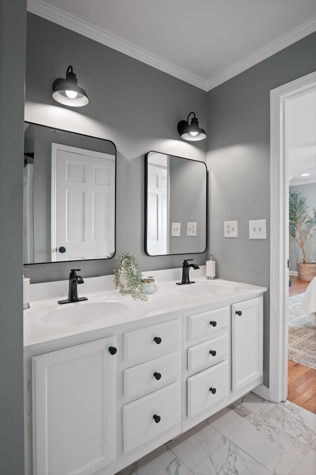 1714 S Crest Manor Ln, Chattanooga, TN 37404 - bathroom featuring double vanity, crown molding, and marble finish floors