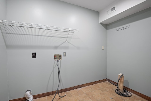 1714 S Crest Manor Ln, Chattanooga, TN 37404 - washroom featuring hookup for an electric dryer, baseboards, and washer hookup