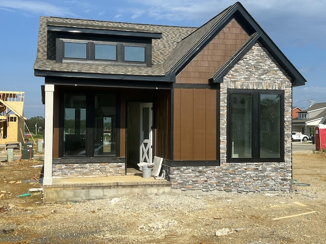146 Idle Place Cir Lot 83, Rossville, GA 30741 - view of front of home featuring stone siding, board and batten siding, and a shingled roof