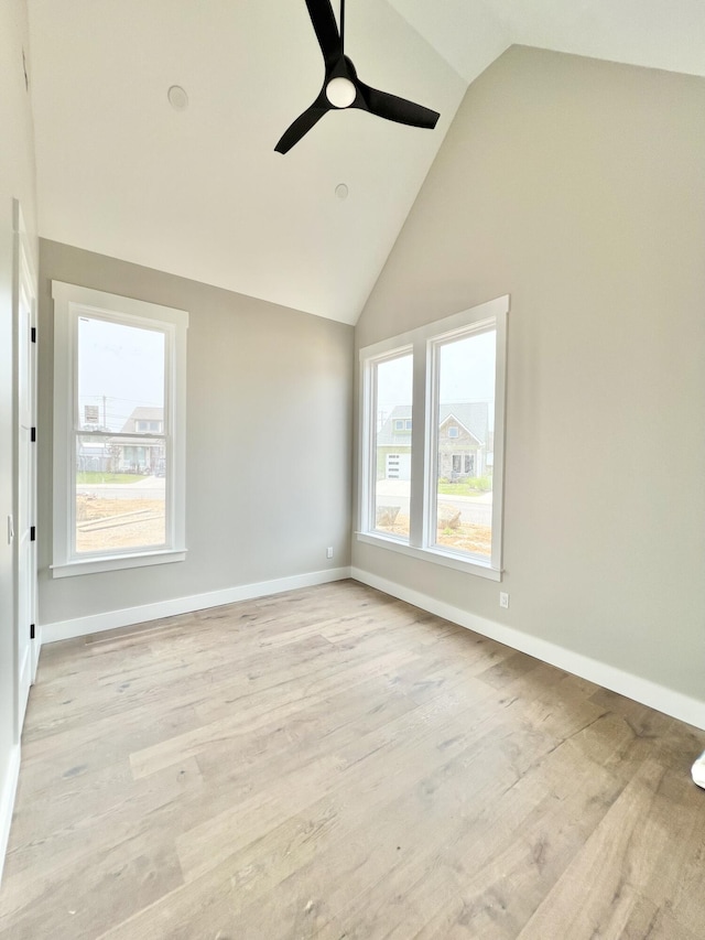 146 Idle Place Cir Lot 83, Rossville, GA 30741 - empty room with vaulted ceiling, ceiling fan, light wood finished floors, and baseboards