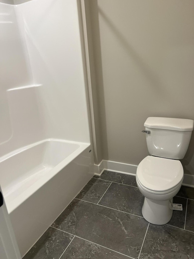 549 Willow Grv Ct Unit 69, Ringgold, GA 30736 - bathroom with toilet, baseboards, and washtub / shower combination