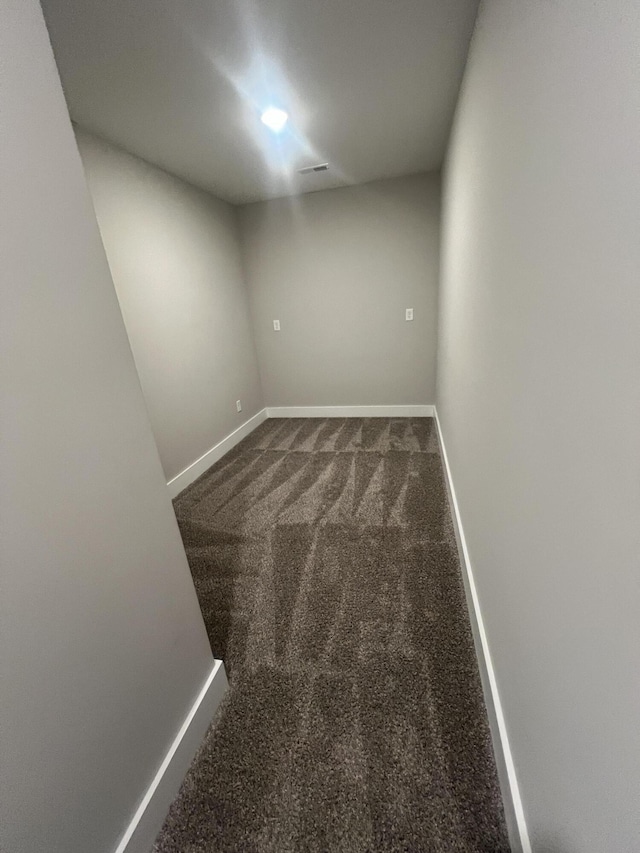 549 Willow Grv Ct Unit 69, Ringgold, GA 30736 - spare room with baseboards and dark colored carpet