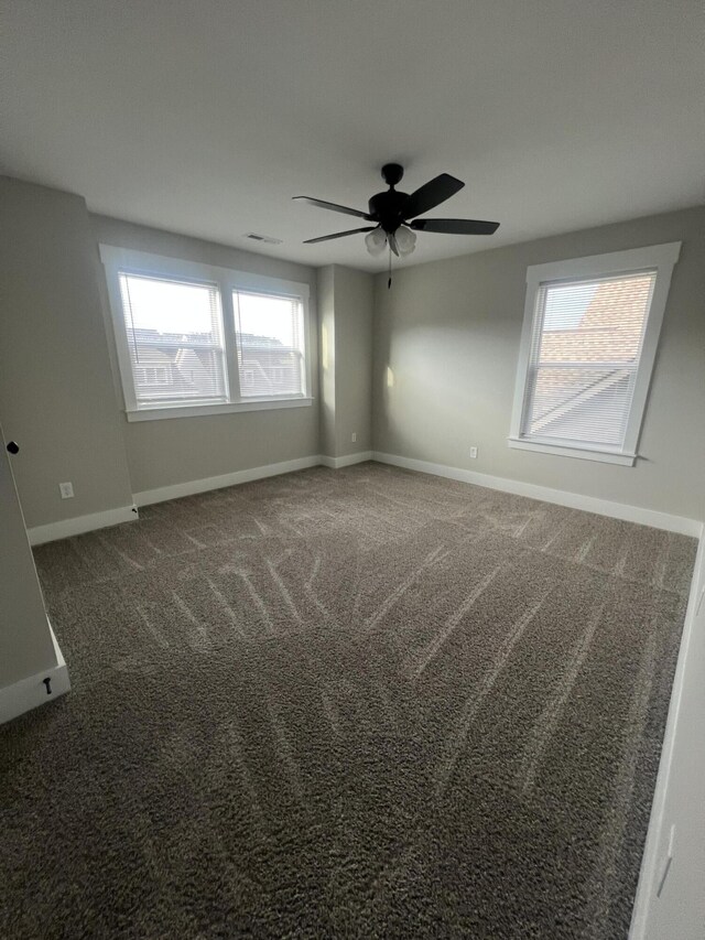 549 Willow Grv Ct Unit 69, Ringgold, GA 30736 - empty room featuring ceiling fan, carpet flooring, and baseboards