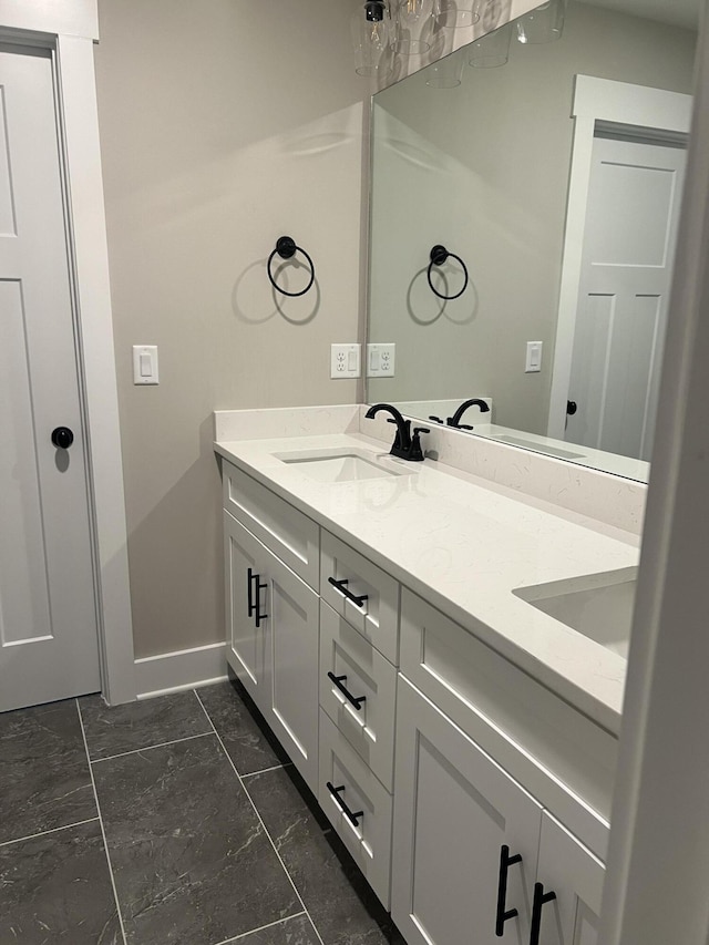 549 Willow Grv Ct Unit 69, Ringgold, GA 30736 - bathroom featuring double vanity, marble finish flooring, and baseboards