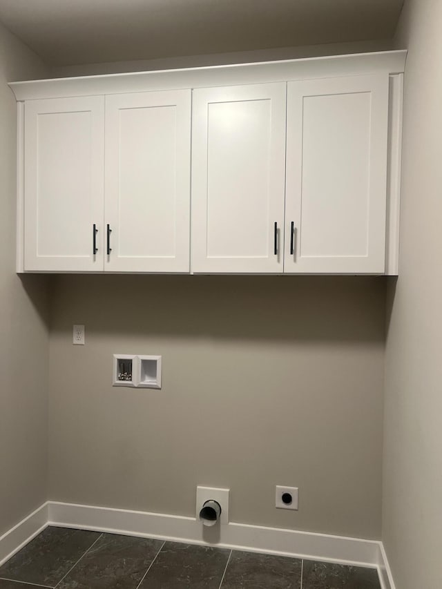549 Willow Grv Ct Unit 69, Ringgold, GA 30736 - laundry area with cabinet space, hookup for an electric dryer, baseboards, washer hookup, and dark tile patterned flooring