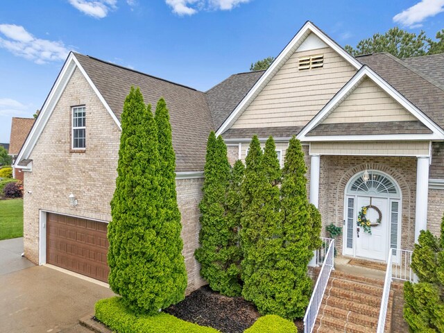 4322 Wellesley Dr, Ooltewah, TN 37363 - view of front of property featuring brick siding and a shingled roof