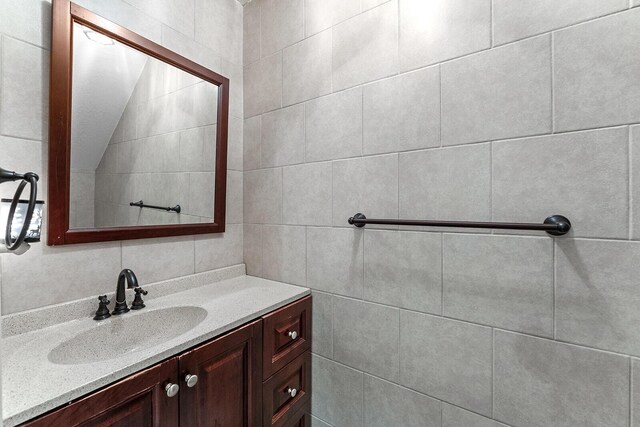 4322 Wellesley Dr, Ooltewah, TN 37363 - bathroom with vanity and tile walls