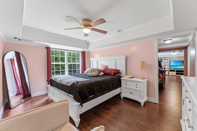 4322 Wellesley Dr, Ooltewah, TN 37363 - bedroom with a raised ceiling, crown molding, dark wood-type flooring, and baseboards