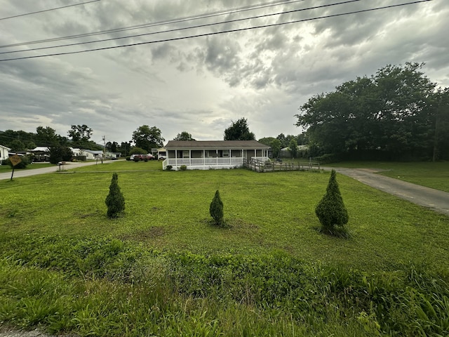 219 Igou Ferry Rd, Soddy Daisy, TN 37379 - view of front facade with a front lawn