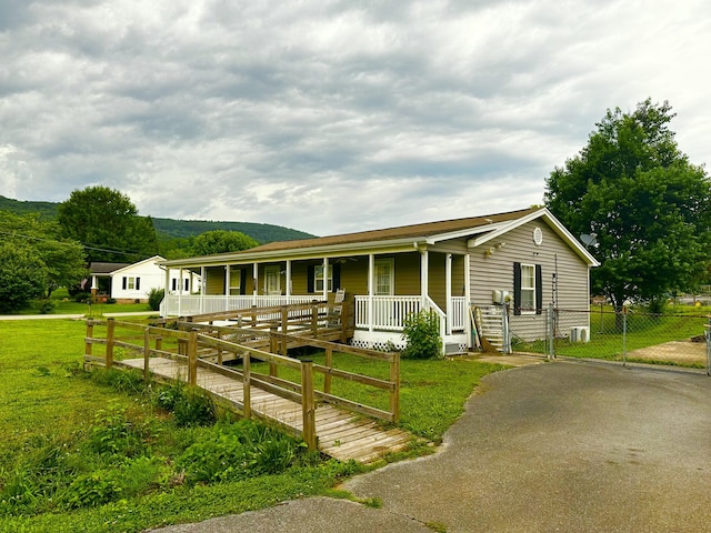 219 Igou Ferry Rd, Soddy Daisy, TN 37379 - single story home with a porch