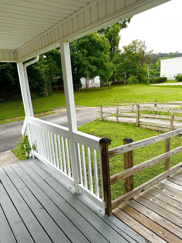 219 Igou Ferry Rd, Soddy Daisy, TN 37379 - wooden porch with a lawn