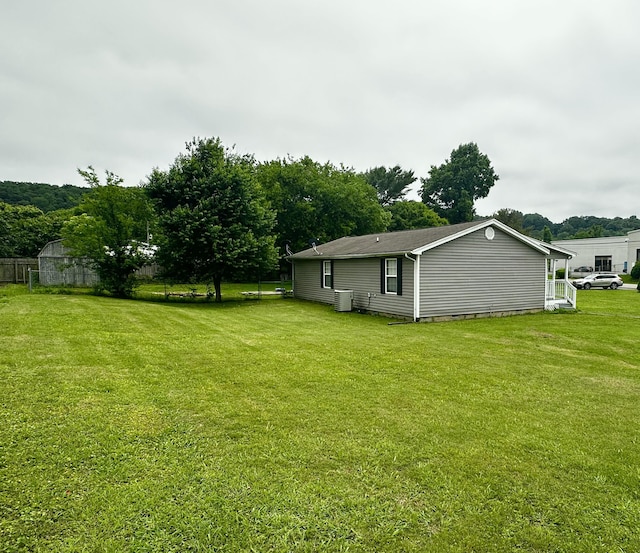219 Igou Ferry Rd, Soddy Daisy, TN 37379 - view of green lawn featuring central AC unit