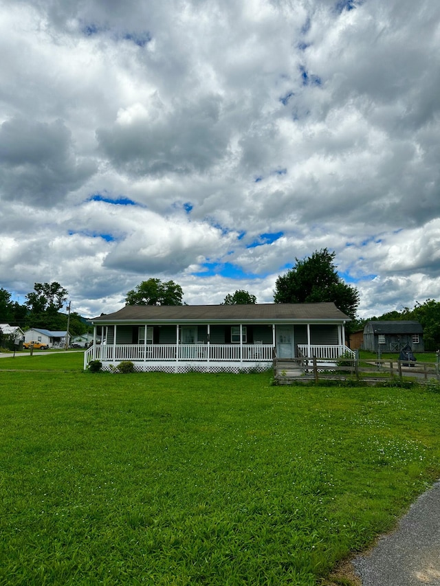 219 Igou Ferry Rd, Soddy Daisy, TN 37379 - view of front of home with a porch and a front yard
