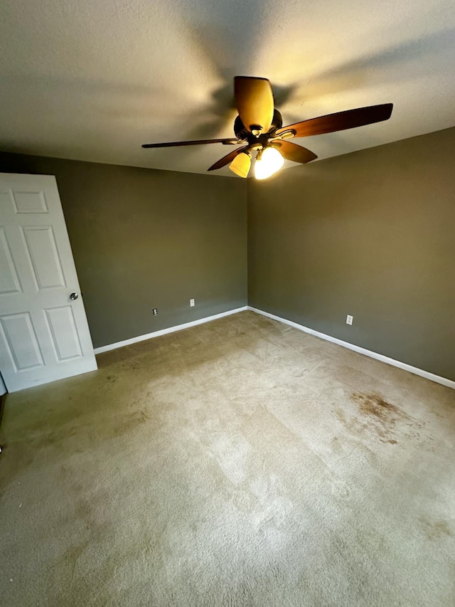 219 Igou Ferry Rd, Soddy Daisy, TN 37379 - unfurnished room with ceiling fan, carpet flooring, and baseboards